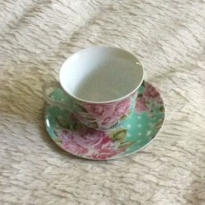 Cup with saucer